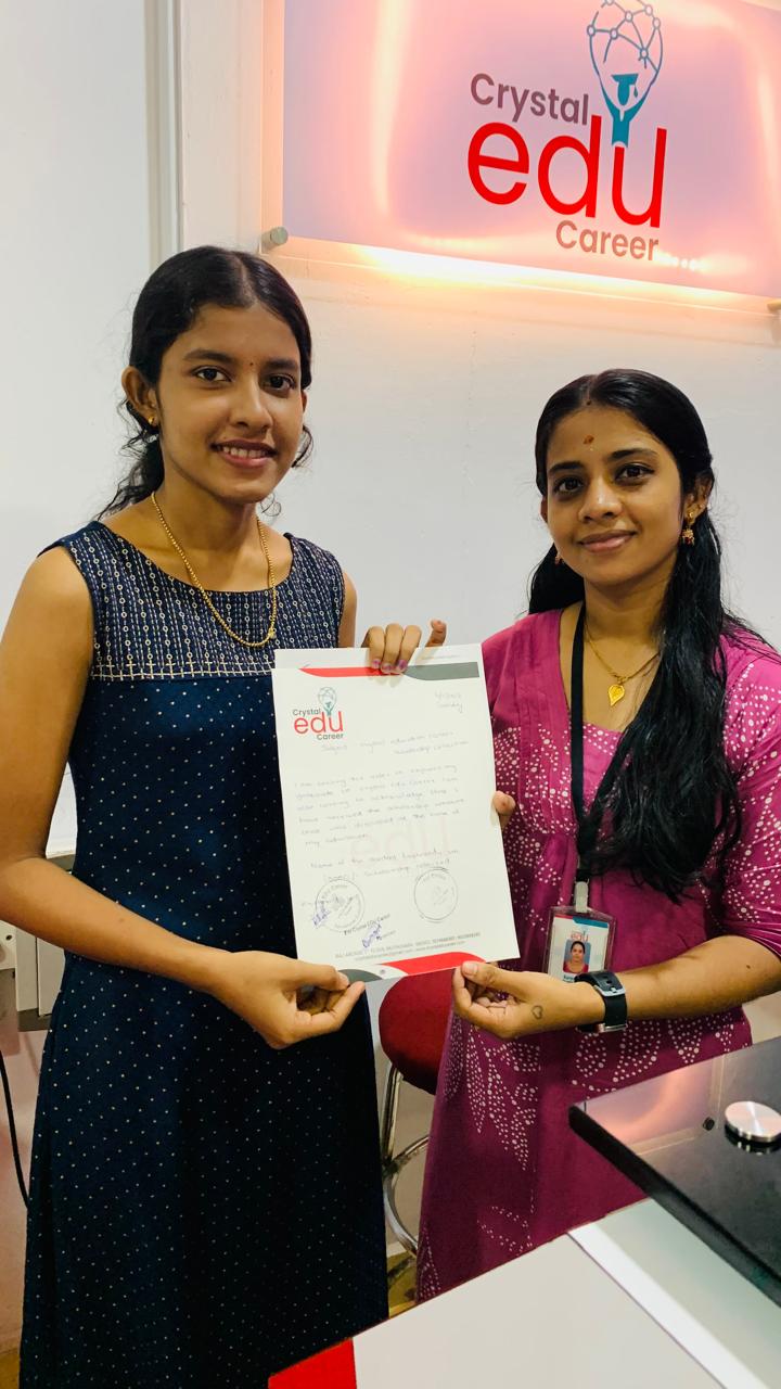 Student and counsellor presenting a completed milestone document